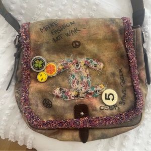 Chanel on the pavement graffiti messenger bag.